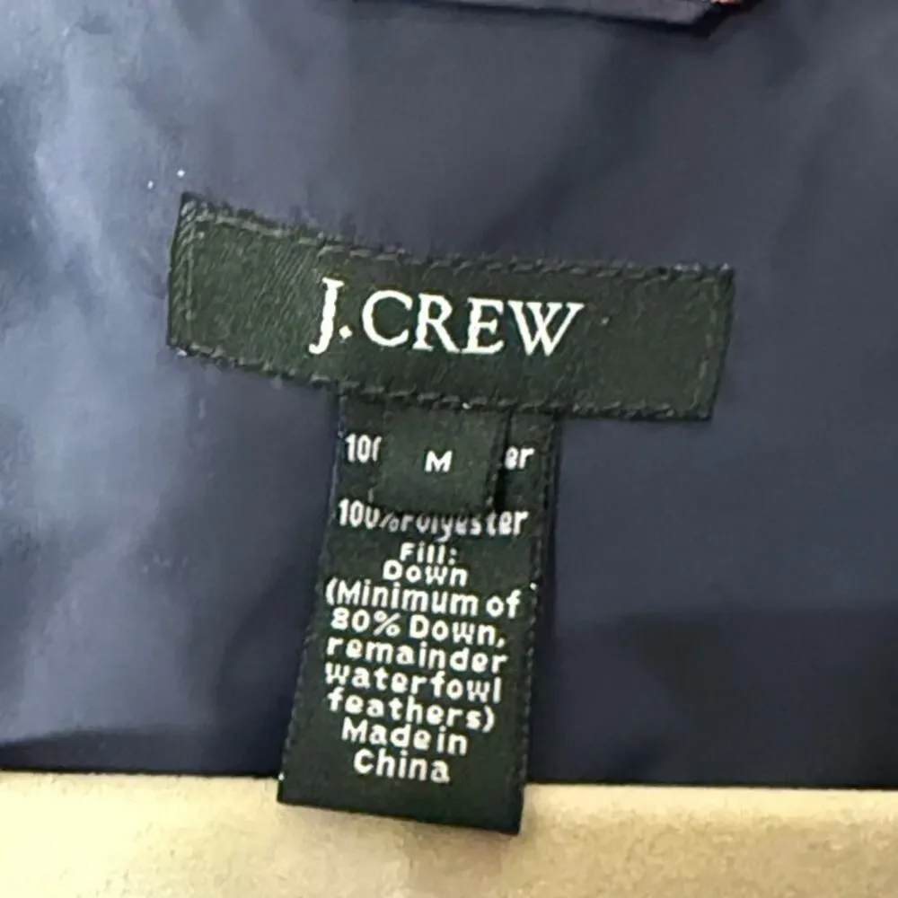 J. Crew men’s blue down filled puff vest size medium.